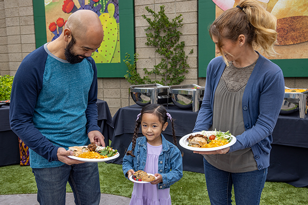 family eating at picnic