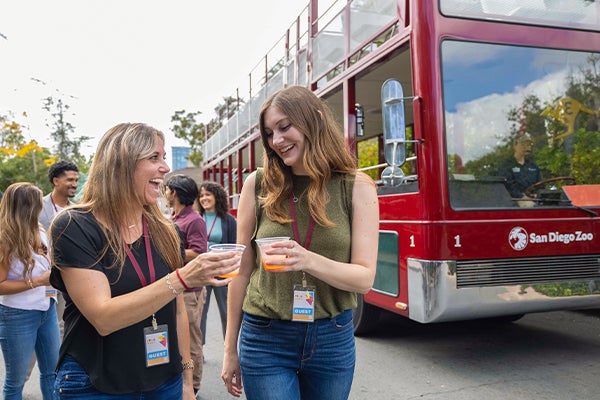 corporate group getting off a bus tour